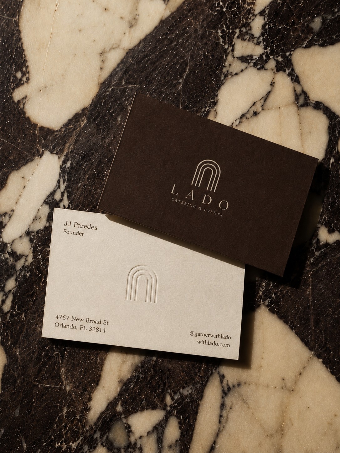 LADO business cards styled on marble