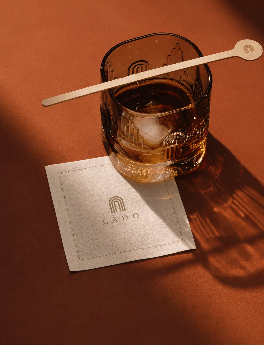 Craft cocktail served on a terracotta tabletop