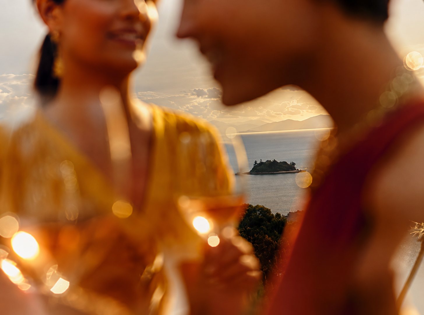 Guests toasting in warm evening light