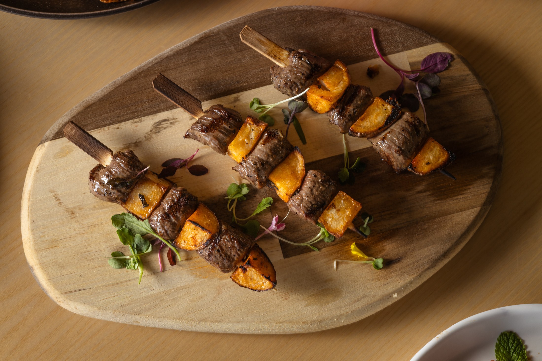 Ember Bites — charred steak and potato skewers