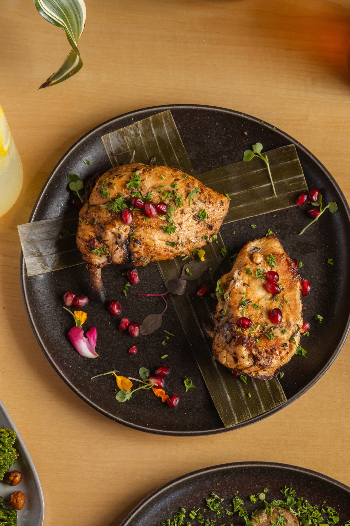 Tierra Aegea — chargrilled chicken with pomegranate, herbs, and citrus